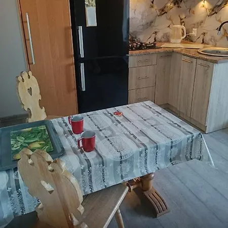 Azyl Apartmán *
